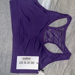 Zyia purple bomber bra size medium. Never worn. Still has tags.